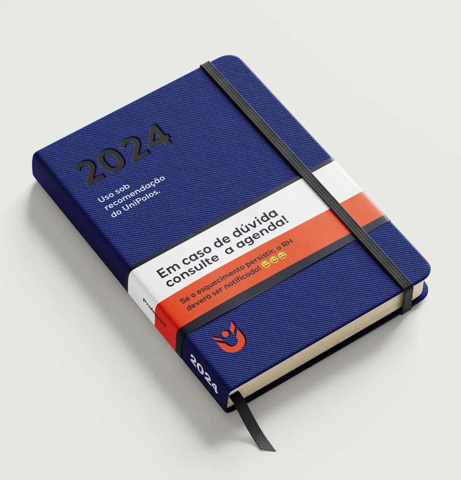 Agenda com uma capa que lembra uma embalagem de remédio. Na capa, está o seguinte texto: "Em caso de dúvida, consulte a agenda. Se a dúvida persistir, o RH deverá ser informado (emoji sorrindo)."
