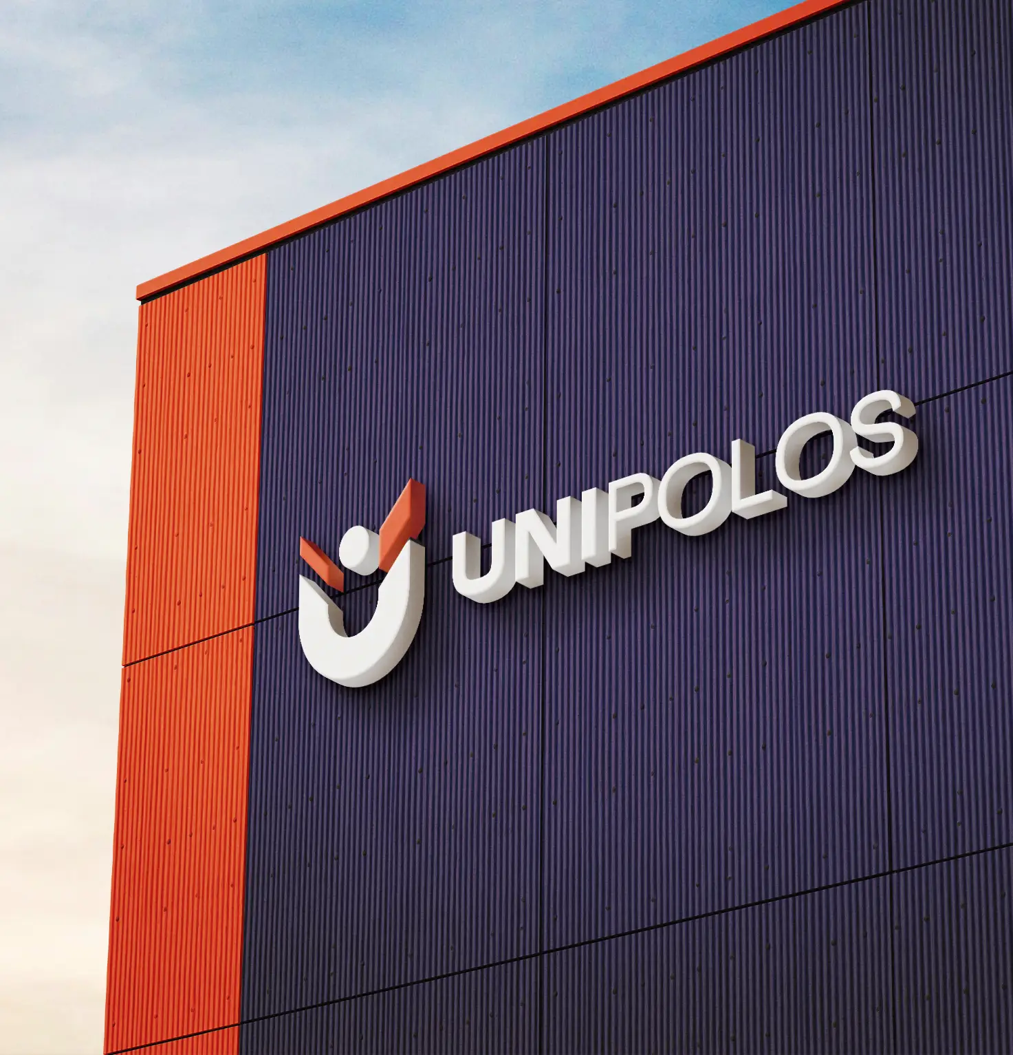 Fachada de um prédio azul-escuro com a logo da UniPolos em destaque.